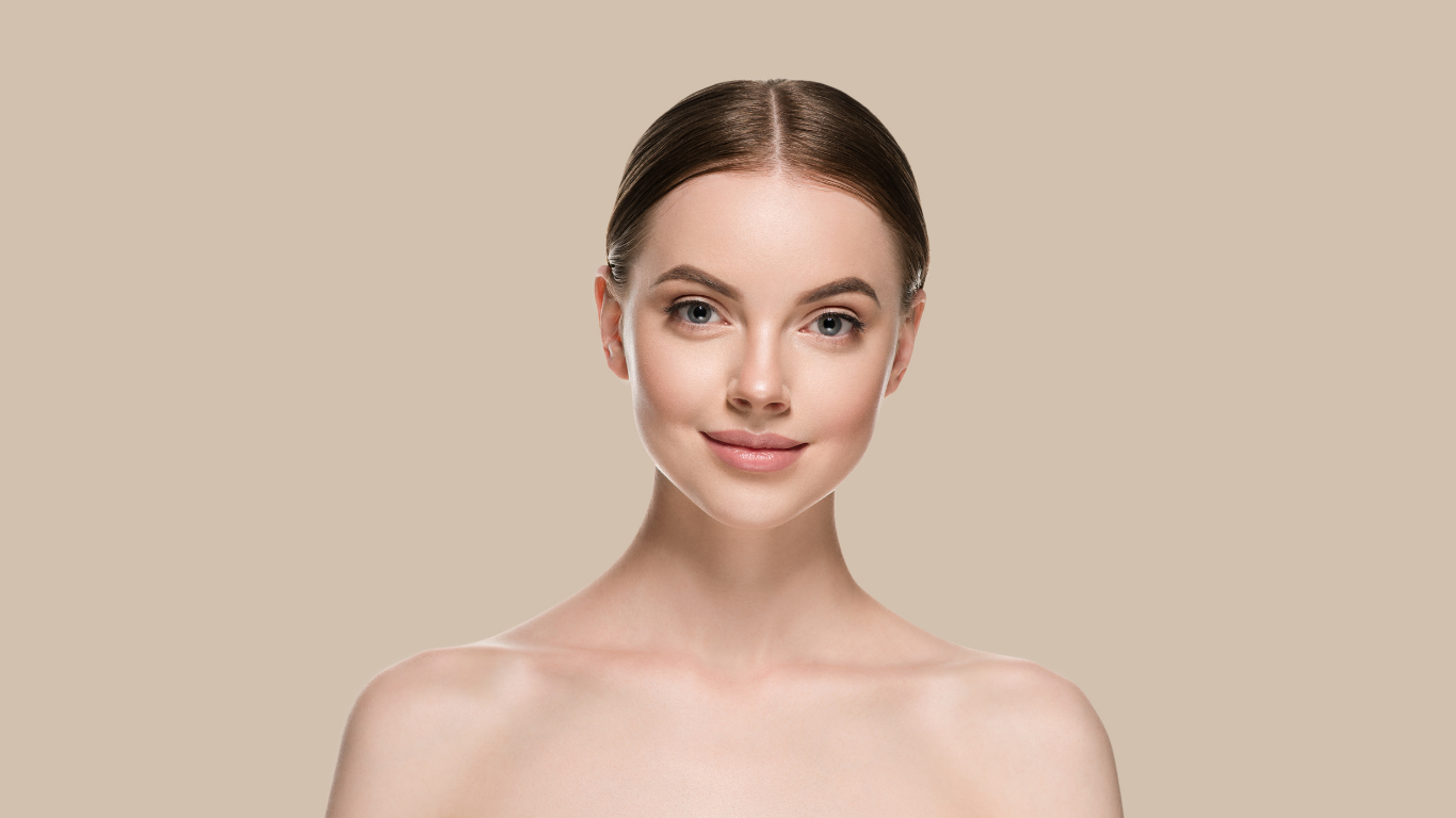 Model showcasing smooth, even-toned skin using Teint Naturelle Foundation. Ideal for a natural, radiant makeup look.