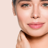 Close-up of glowing skin with Teint Naturelle Foundation. Breathable, hydrating formula for a fresh, dewy finish.