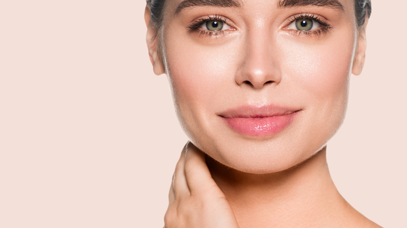 Close-up of glowing skin with Teint Naturelle Foundation. Breathable, hydrating formula for a fresh, dewy finish.