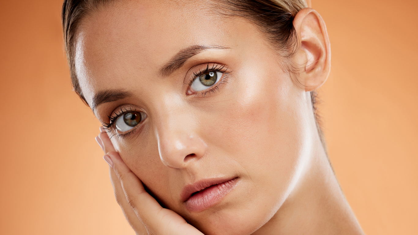 Model with subtle glow wearing Teint Naturelle Foundation. Ideal for a soft, natural makeup finish.