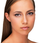 Model with even-toned skin using Teint Naturelle Foundation. Lightweight, buildable coverage for a flawless base.