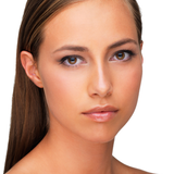 Model with even-toned skin using Teint Naturelle Foundation. Lightweight, buildable coverage for a flawless base.