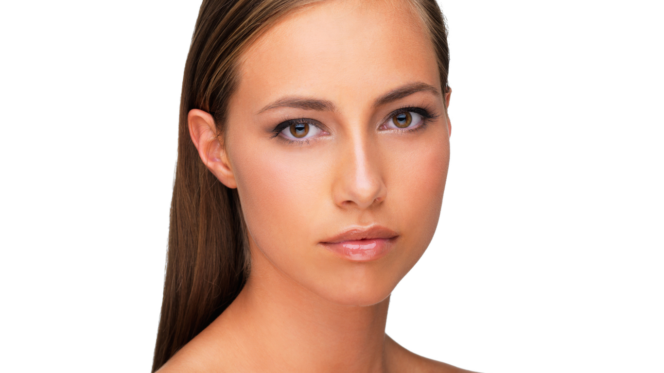Model with even-toned skin using Teint Naturelle Foundation. Lightweight, buildable coverage for a flawless base.