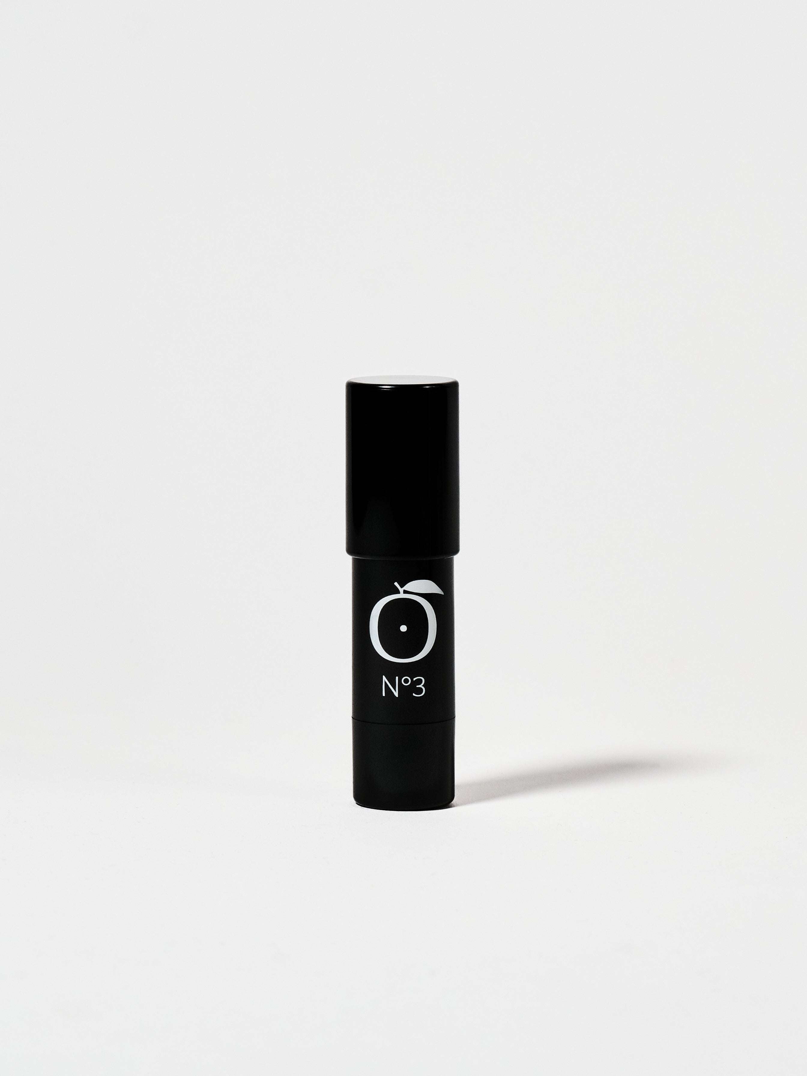 Moonlit Rose - Champagne Rose Highlighter No.3 in sleek black tube packaging, ideal for radiant glow and 13hr wear in face makeup routines.