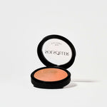 Sunkissed Blush-Bronzer in open compact with radiant peachy tone. Silky glow finish ideal for all-day wear and buildable face makeup.