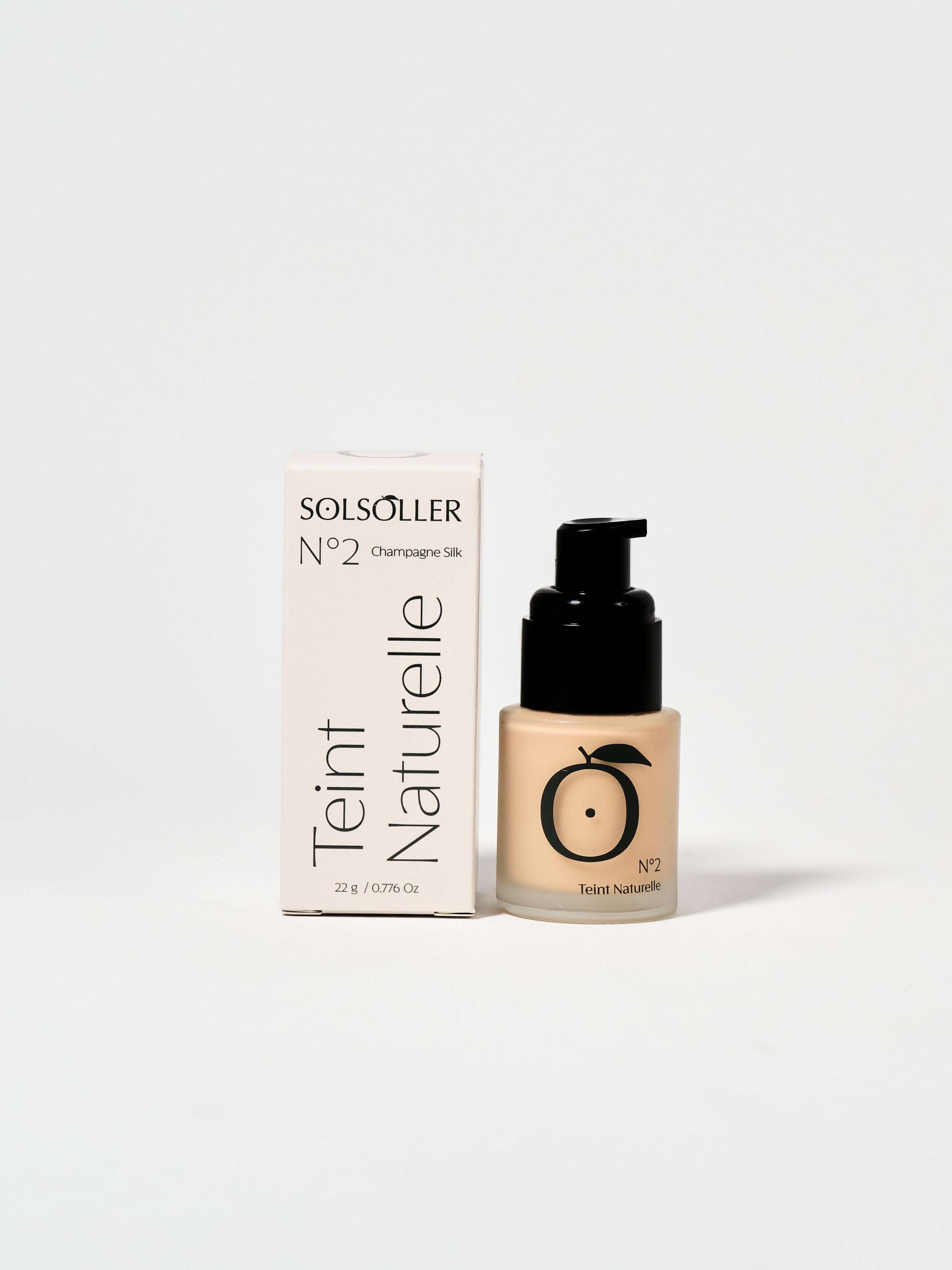 Teint Naturelle Foundation No.2 Champagne Silk with neutral undertone for fair to light skin, offering radiant silk glow and real-skin finish.