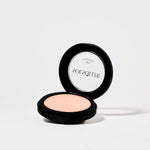Open compact of L'marcela: Long-Lasting and Pore-Friendly Baby Pink Setting Powder revealing the soft pink pressed powder for smooth coverage.