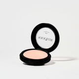 Open compact of L'marcela: Long-Lasting and Pore-Friendly Baby Pink Setting Powder revealing the soft pink pressed powder for smooth coverage.