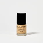 Back of Teint Naturelle Foundation bottle in Satin Almond. Features product message and shade details.