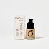 Teint Naturelle Foundation in Satin Almond by Solsoller with box. Hydrating, breathable base for medium skin tones.