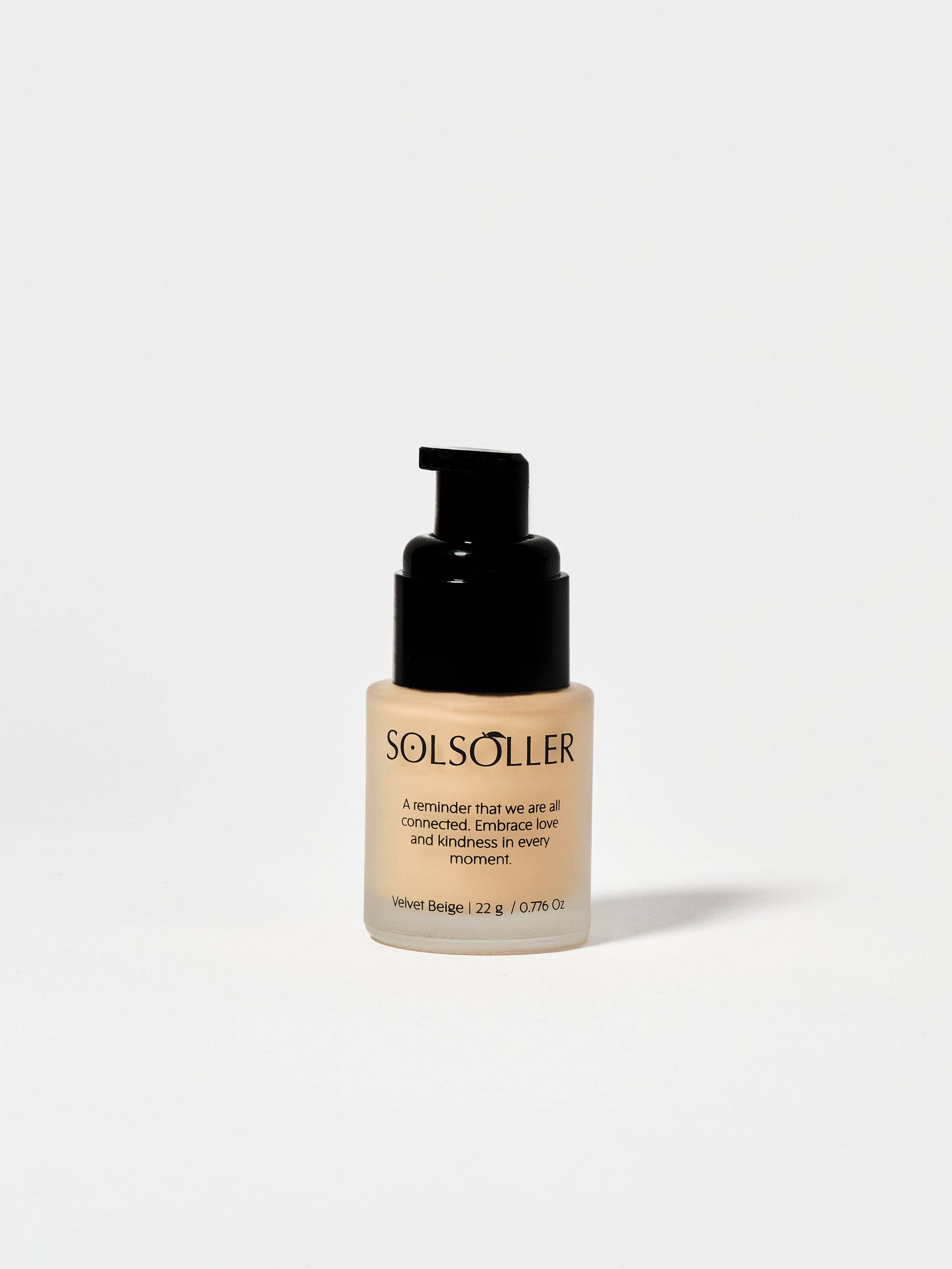 Back view of Teint Naturelle Foundation bottle in Velvet Beige. Inspirational message printed on packaging.