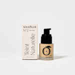 Teint Naturelle Foundation in Velvet Beige by Solsoller with box packaging. Lightweight, breathable face makeup for radiant skin.