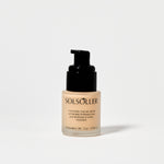Back of Teint Naturelle Foundation bottle in Champagne Silk. Features inspirational quote and product details.