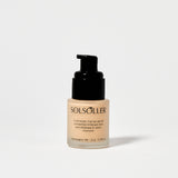 Back of Teint Naturelle Foundation bottle in Champagne Silk. Features inspirational quote and product details.