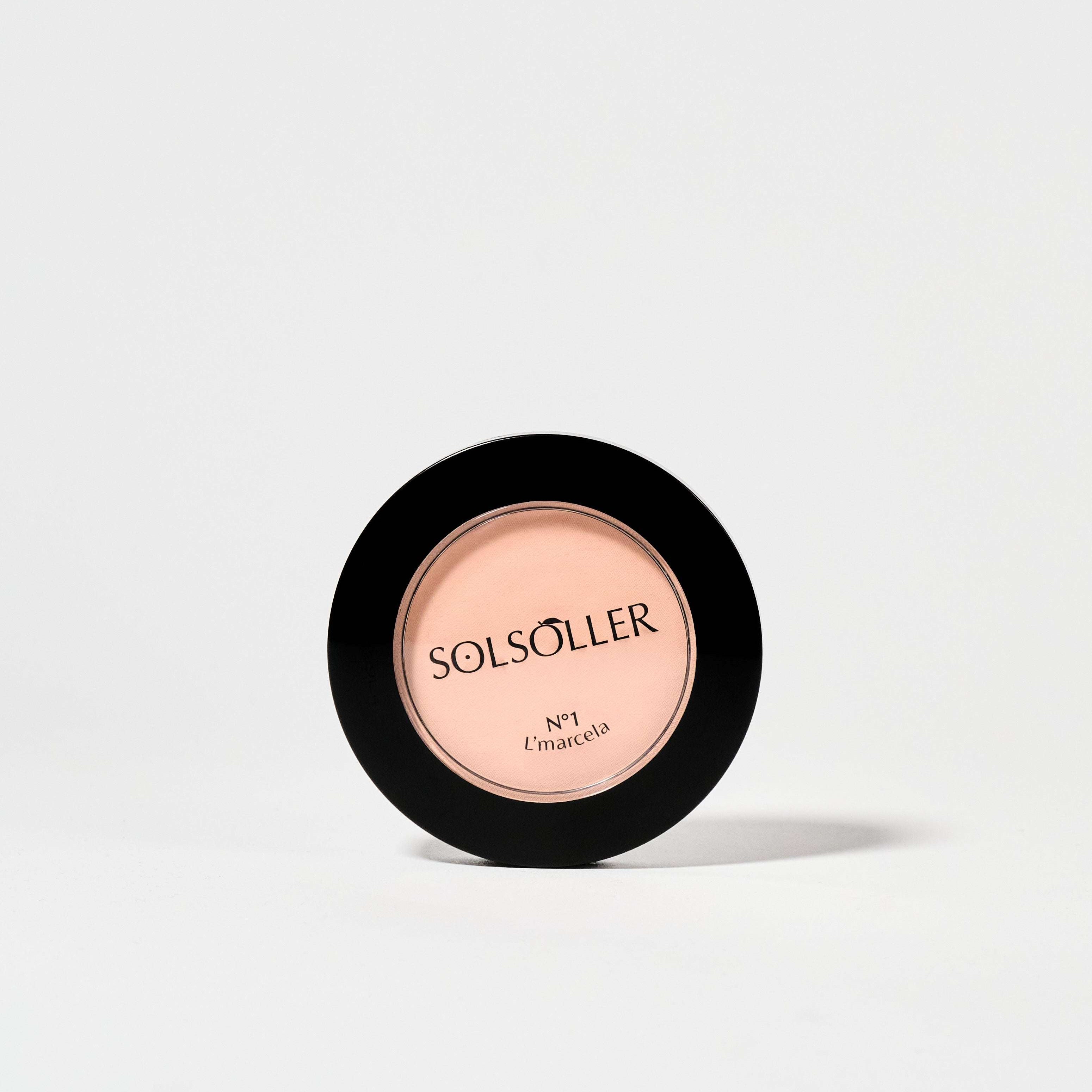 L'marcela: Long-Lasting and Pore-Friendly Baby Pink Setting Powder in a sleek black compact, ideal for flawless face makeup application.