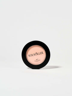 L'marcela: Long-Lasting and Pore-Friendly Baby Pink Setting Powder in a sleek black compact, ideal for flawless face makeup application.