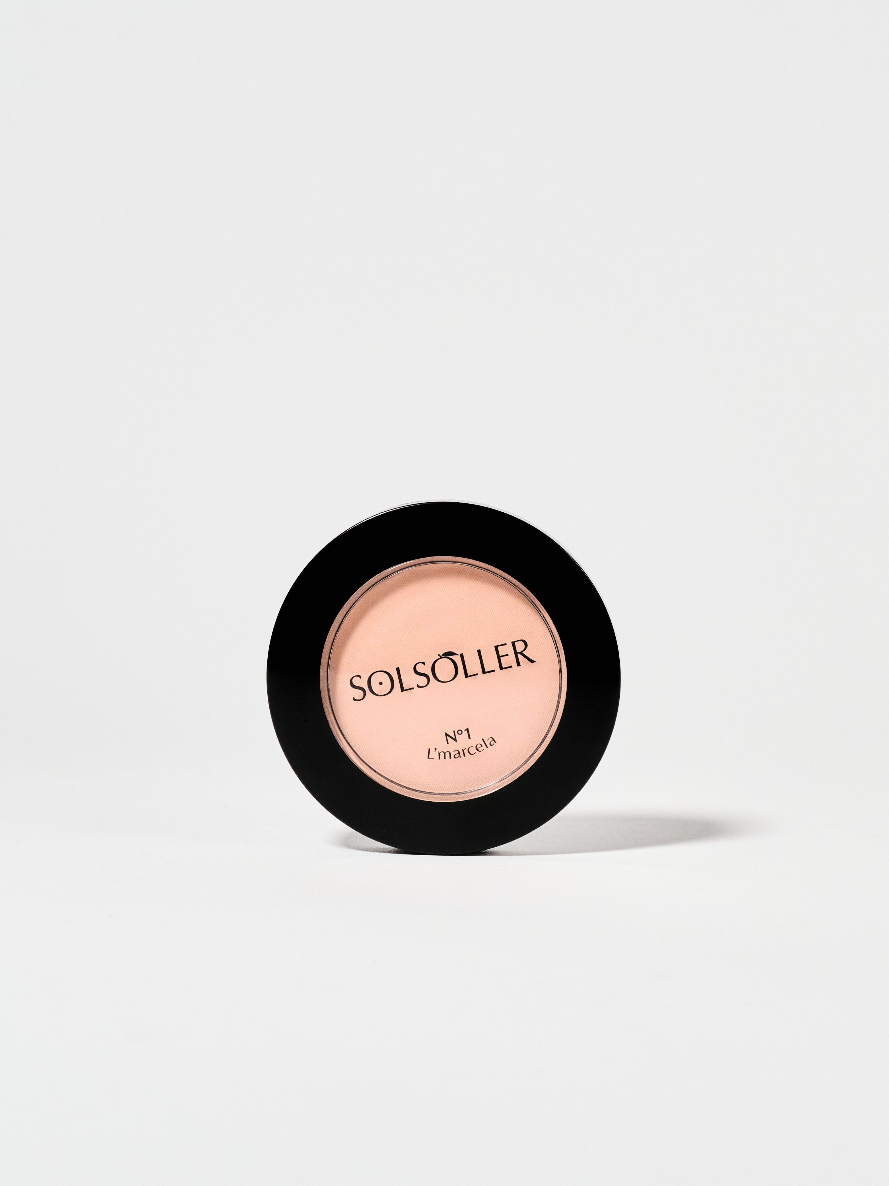 Top view of L’Marcela Setting Powder compact labeled Solsoller No.1, ideal for achieving a lightweight, shine-free makeup look.