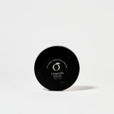 Bottom view of L’Marcela Setting Powder compact with product label, emphasizing its long-lasting, shine-controlling formula.