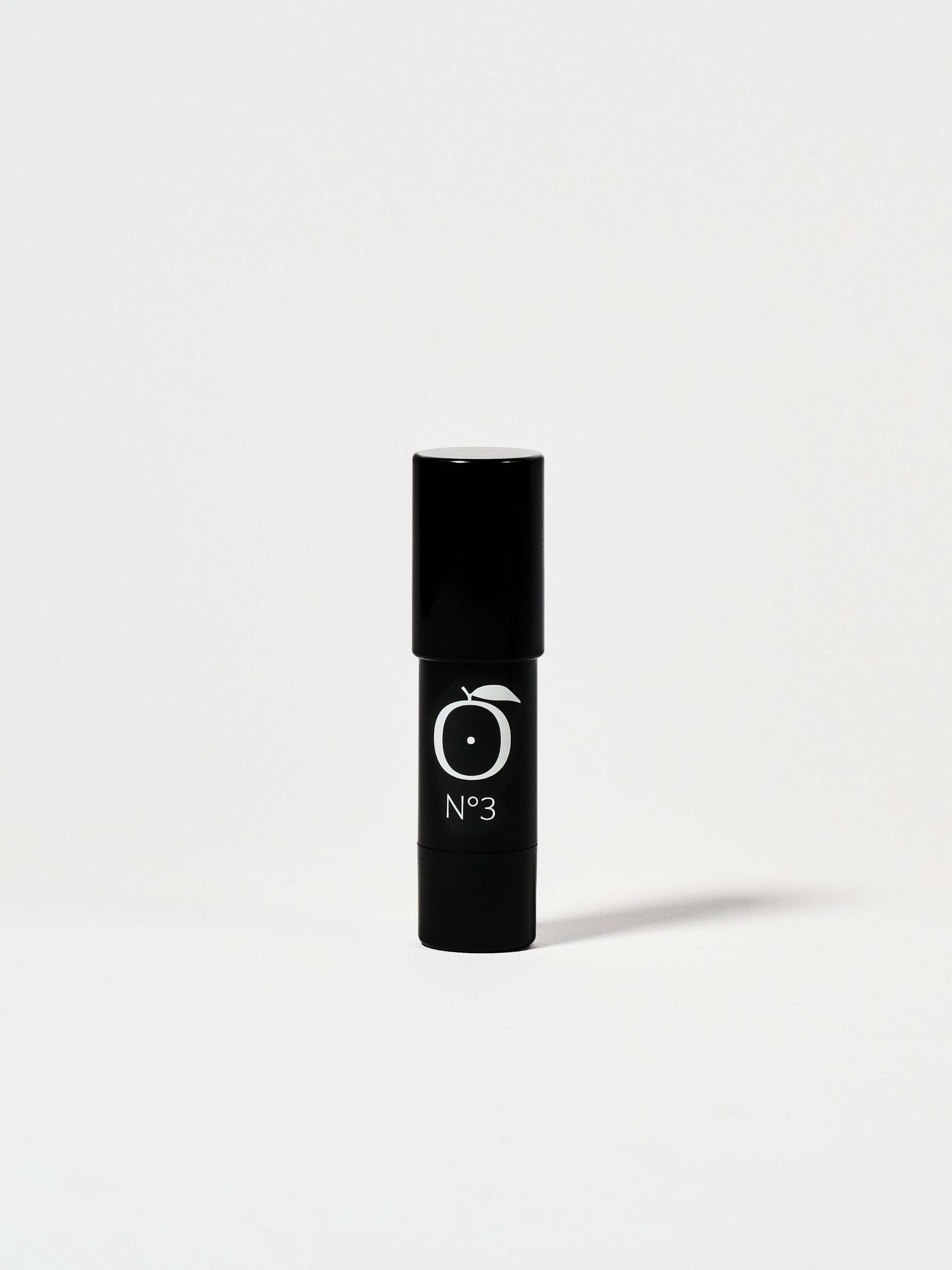 Golden Mirage - Coral Glow Highlighter No.3 in sleek black tube, ideal for long-lasting radiant makeup in face highlighter category.